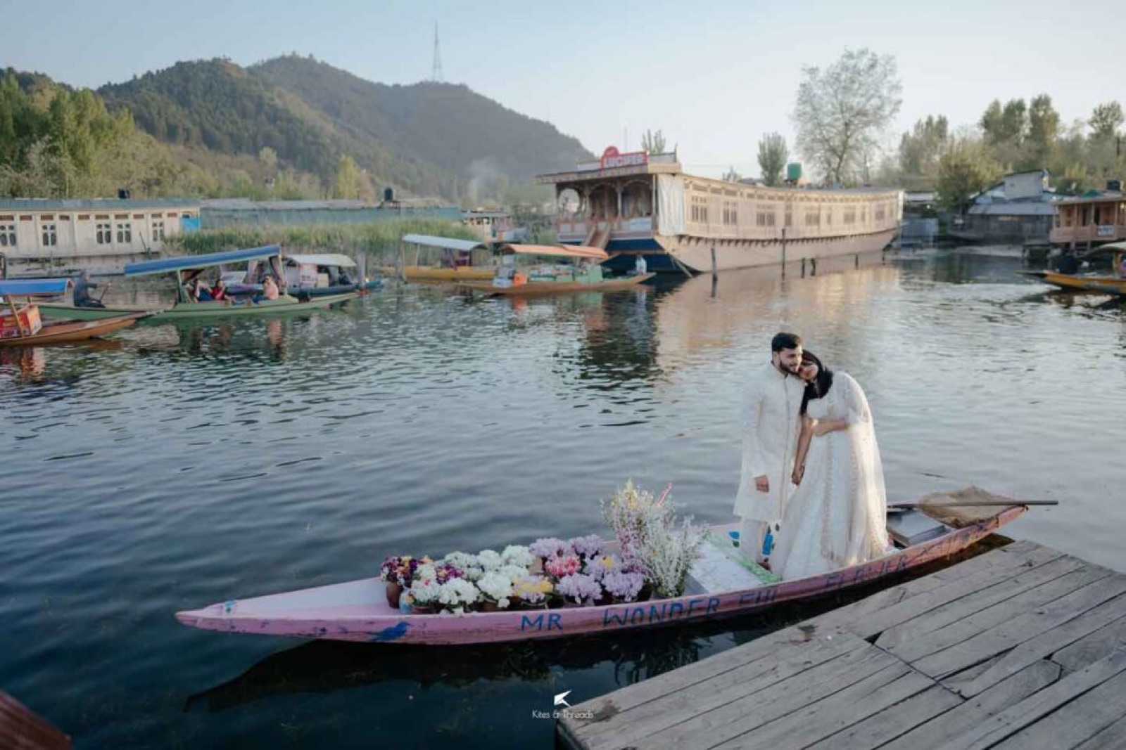 Rakesh and Surbi on a decorated shikara on Dal Lake